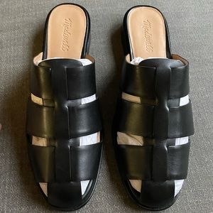 Black leather fisherman mules. Runs small. Size 9 but fits a size 8.